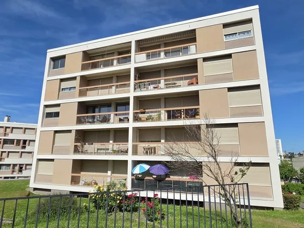 Appartement T4 avec garage, proche du centre-ville