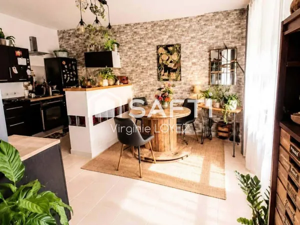 APPARTEMENT en rez-de-chaussé de 52 M2 avec garage.