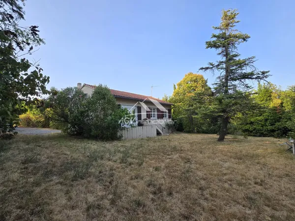 6920 m² de terrain constructible + maison