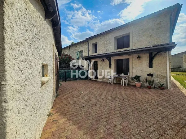 Maison en pierres avec double garages