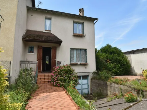 Maison avec garage XXL et fort potentiel