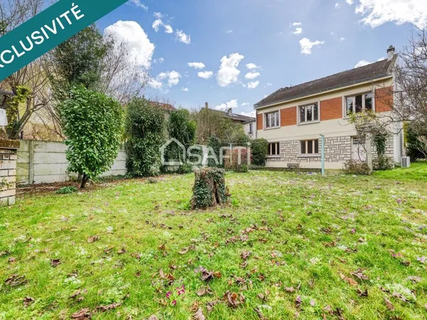 Maison familiale avec grand jardin arboré