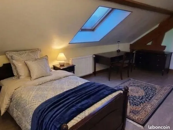 Une chambre en colocation maison