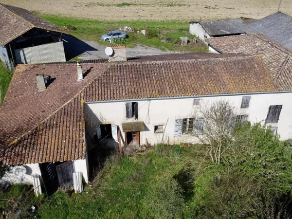 Propriété à rénover avec jardin