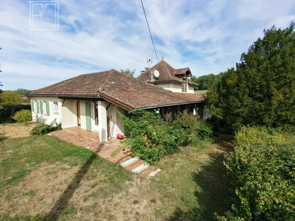 Maison sur 1400 m² de terrain
