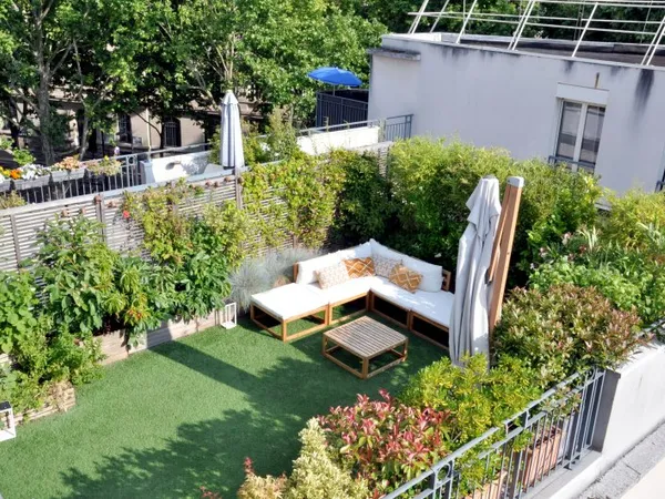 Vends appartement 90m² Paris 18ème - Duplex avec terrasse de rêve