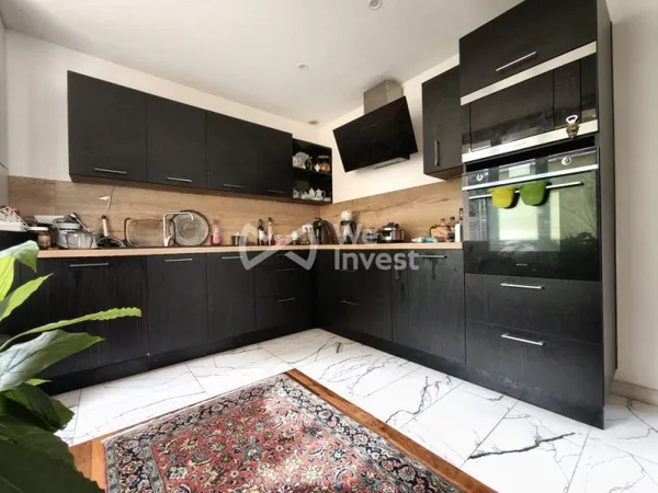 A vendre Ensemble Immobilier (deux maisons)