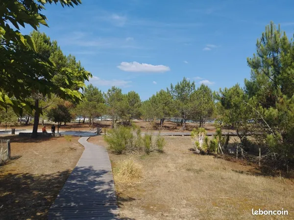 Magnifique terrain arboré de 1 056 m² - proche port médoc et plage de la chambrette