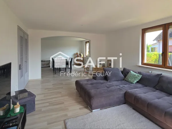 Appartement rénové avec jardin, cave et garage