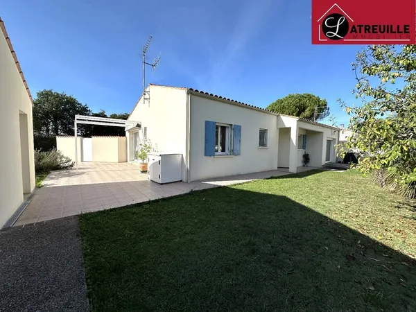 Maison de plain-pied de 101 m² à Tesson avec jardin et garage