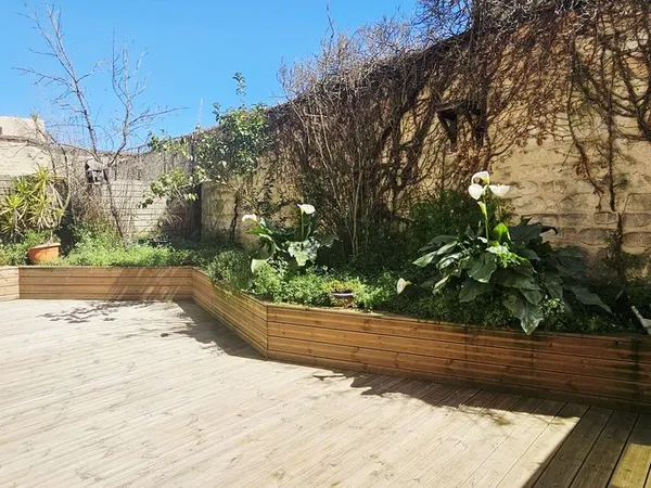 LOFT 150 m² Carrez + terrasse (35 m²) + garage (32 m²) + jardin d'hiver + atelier + cave