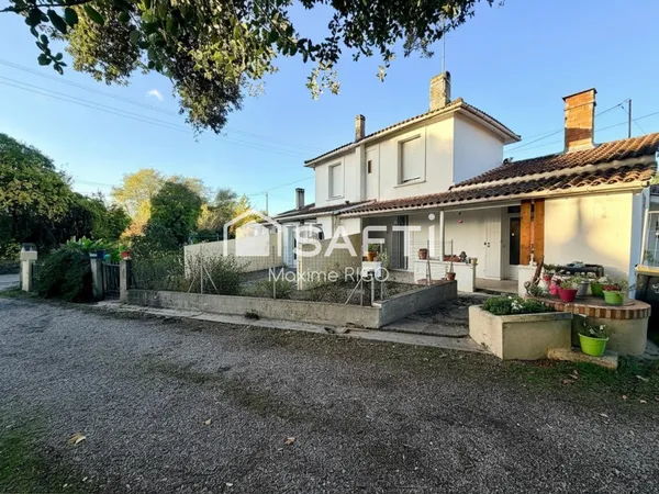 Immeuble de rapport - 5 appartements et 7 garages