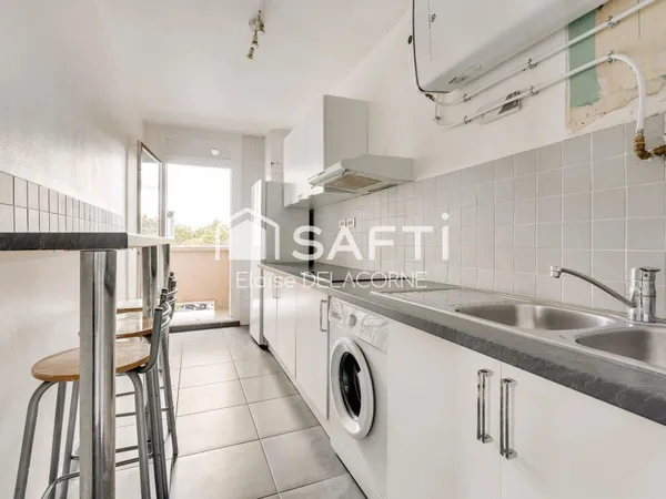 Appartement 55 m² AVEC BALCON, CAVE ET BOX FERMÉ