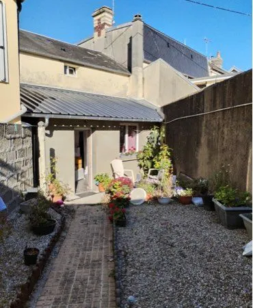 Maison plein centre