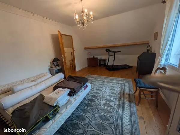 Grande chambre chez l'habitant