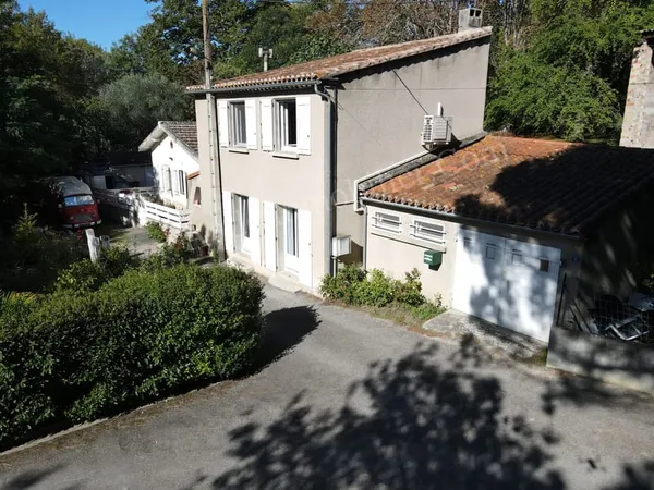 Ensemble de 2 maisons avec jardin et garage