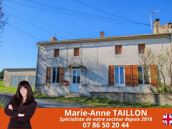 Maison à réinventer avec trois garages sur un terrain de 6 498 m2