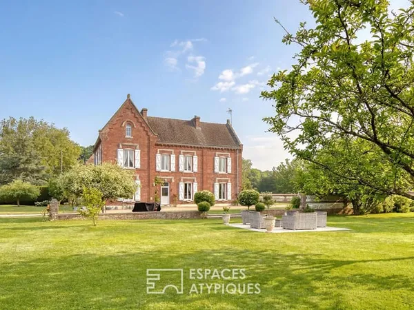 Maison de maître de 1860 dans un parc arboré