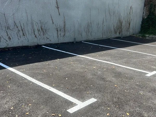 Parking fermé à vendre - hypercentre de Belley - investissement locatif