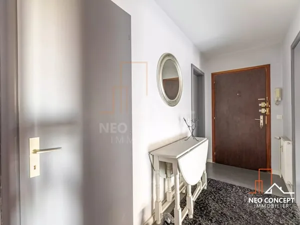Appartement 2 pièces de 57,27 m² - Dernier étage - Ascenseur - Terrasse - Parking - Grenier