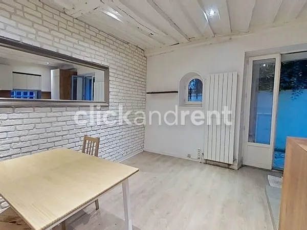 Superbe 2 pièces en duplex plein de charme - Poutres, briques