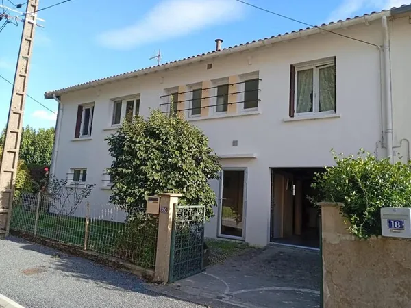 Maison mitoyenne de 85m² avec jardin et sous-sol