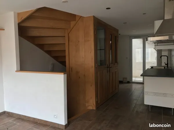 RDC commerce avec appartement