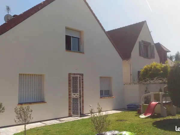 Appartement F3 dans pavillon avec jardin privatif