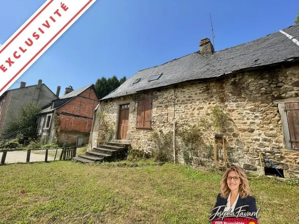 Grange de 150 m² en pierre avec partie habitation à rénover - Chamberet