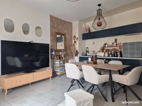 Mionnay T2 de 49,40 m² avec balcon et double stationnement en sous-sol