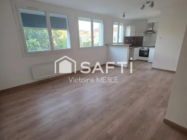Joli Appartement d'une superficie de 49 m 2, offrant un un salon de 26 m2 ouvert sur un espace cuisi