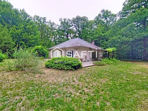Maison avec studio indépendant sur terrain boisé