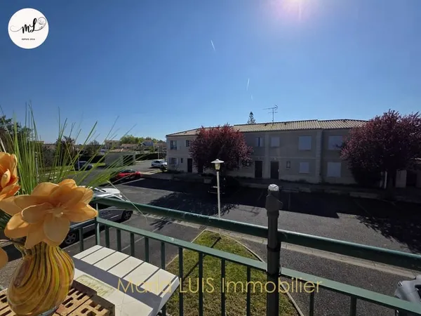 Appartement type 2 dans le centre de la commune avec 2 place