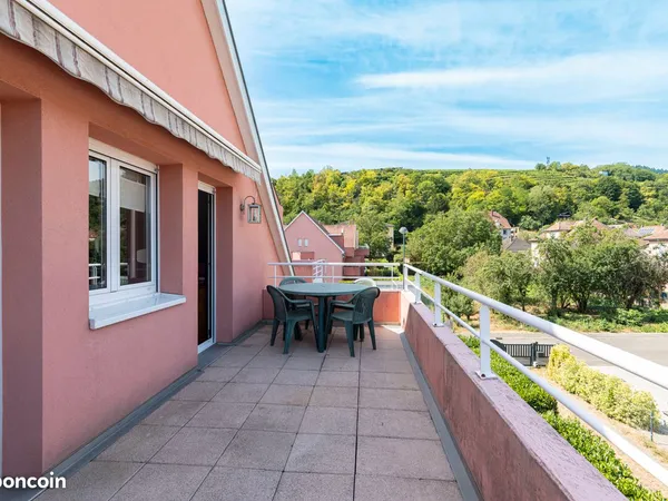4 pièces de 103 m2 avec terrasse, balcon, et 2 places de parking
