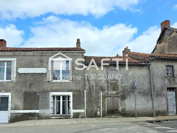 Maison 111m², 3 chambres, dépendances et grange.
