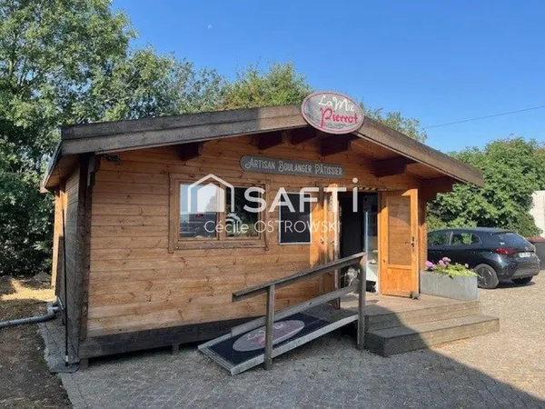 LOCAL COMMERCIAL AVEC BAIL EN COURS  CHALET BOIS, PARKING ET TERRAIN
