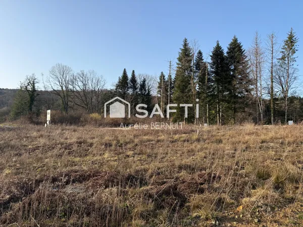 A bâtir, calme, proche Besançon/commodités de Saône