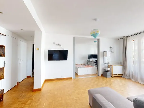 Appartement 3 pièces 59 m² avec grand balcon, cave et parking et jardin collectif