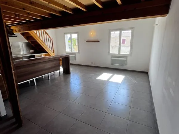 Appartement en R+1 proche centre ville