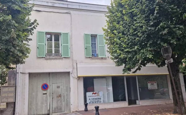 IMMEUBLE D'HABITATION ET COMMERCE