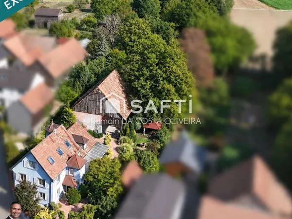 Superbe propriété composée d'une spacieuse maison d'habitation, d'une ancienne grange et d'un magnif