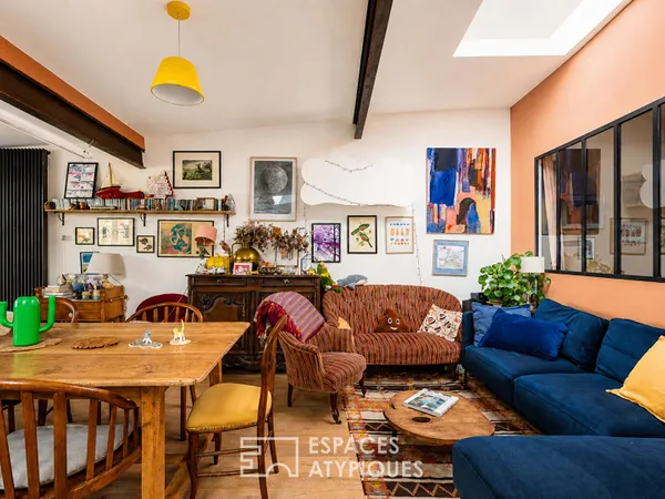 Loft avec terrasse paysagée dans une ancienne maison-boutique ouvrière