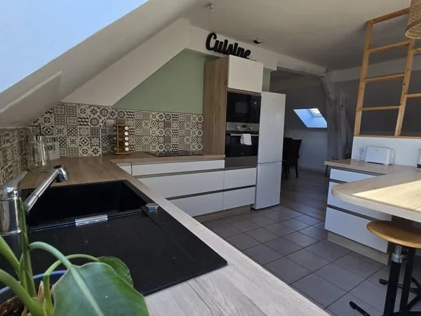 Charmant appartement 3/4 pièces sous combles