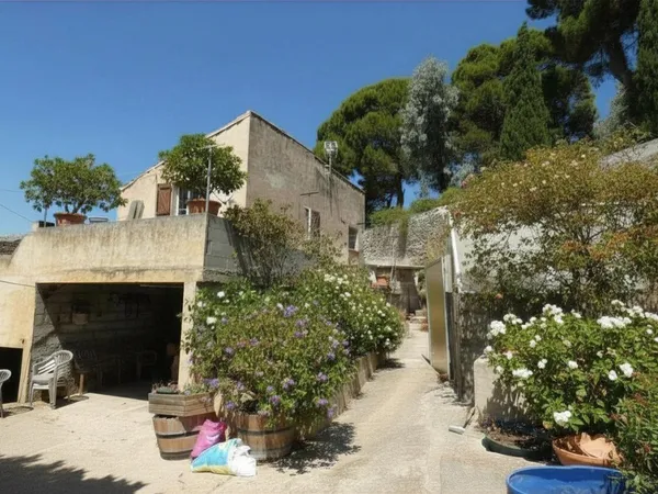 Maison de village 130m² + remise, 4 chambres, garage, terrasse et jardin