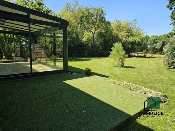 Maison au coeur d'un écrin de verdure, calme absolu