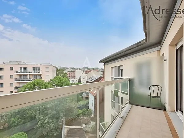 Appartement familial 4 pièces avec 2 balcons, 2 parkings et cave