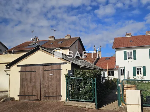 Maison mitoyenne,4 pièces,2 chambres,garage,jardin