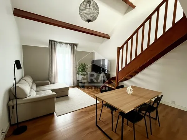 Appartement 2 chambres et mezzanine. Parking box.