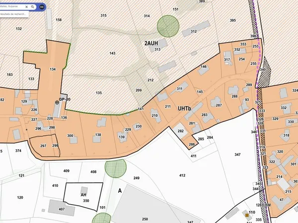 Terrain 800 m² en zone UHTb