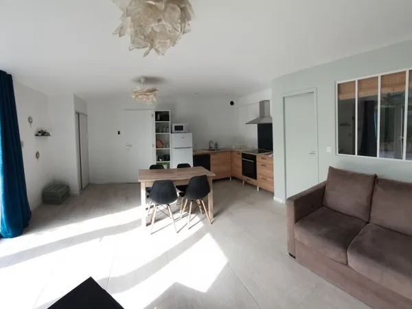 T2 avec parking et terrasse. Eau et élec inclus